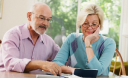 Why middle age is getting harder: Thousands more in 40s and 50s are having to care for frail parents AND adult children