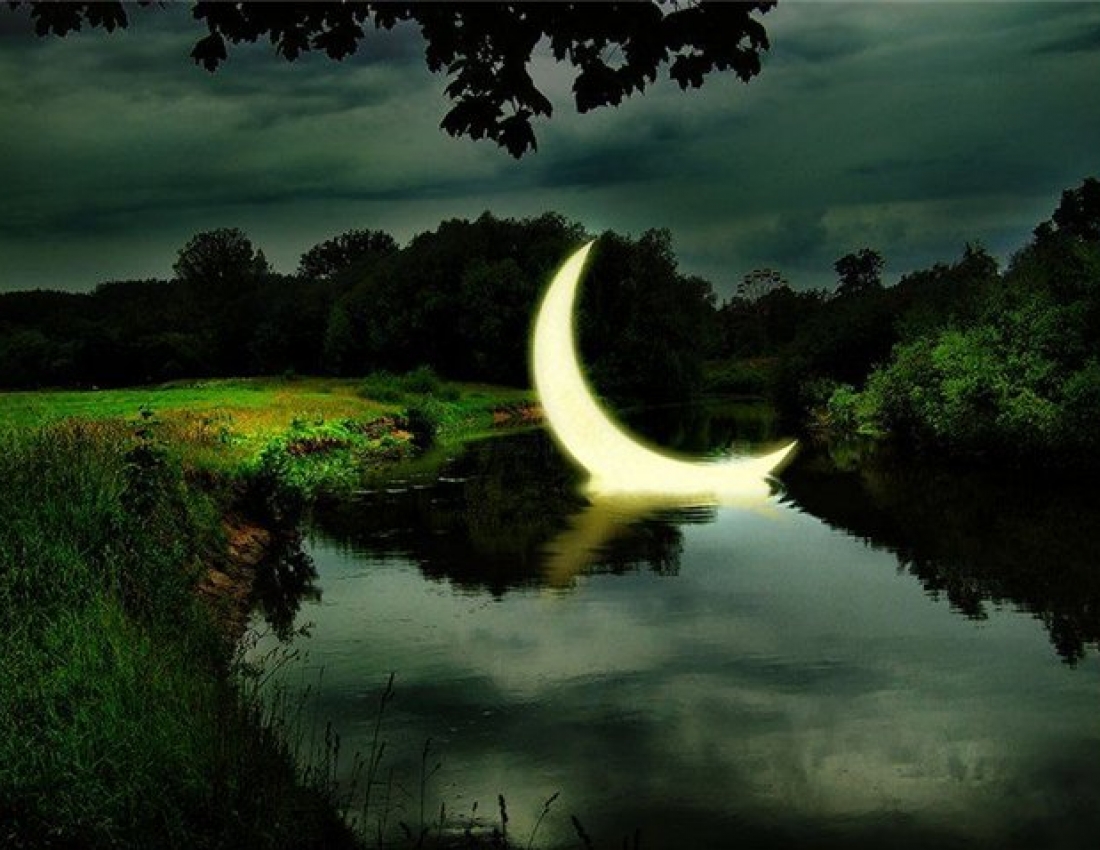Moon emerging like a golden horn...