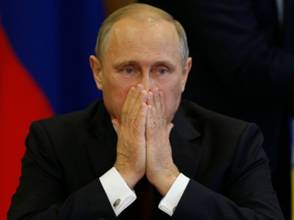 Британская газета заподозрила Меркель в секретных переговорах с Путиным по Украине. Фото: Reuters Британская газета заподозрила Меркель в секретных переговорах с Путиным по Украине. Фото: Reuters