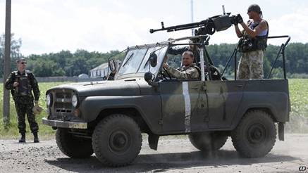 Ukrainian government troops are controlling roadblocks in some parts of the east